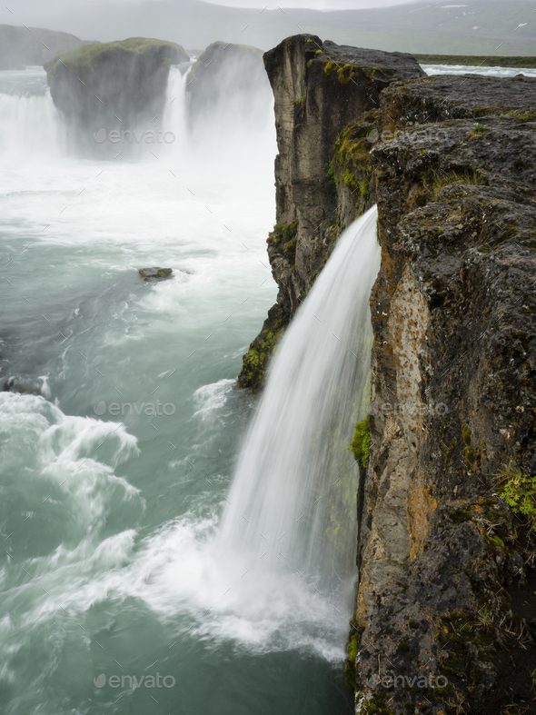 Selfoss waterfall, a cascade of water over a sheer cliff.