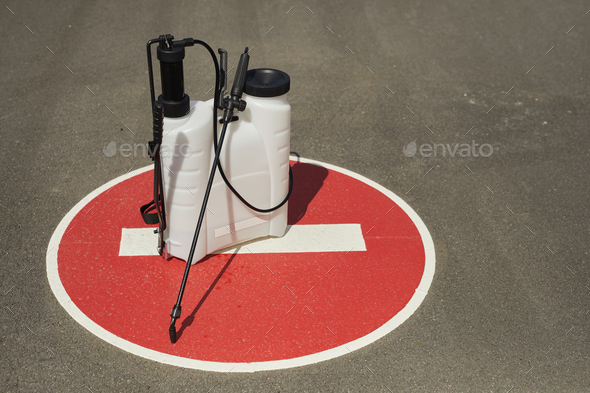 Disinfection Equipment on Stop Sign - Stock Photo - Images