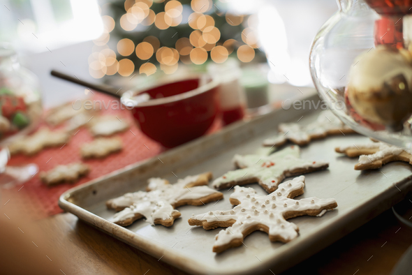 Star shaped Christmas cookies in an oven tray before baking Stock