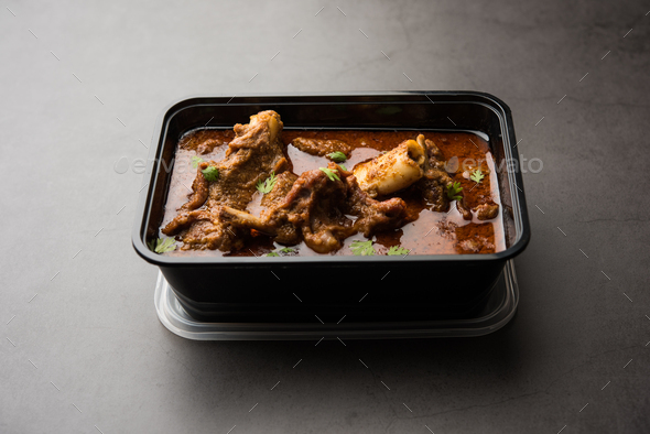 Mutton Masala Curry in plastic container for home delivery