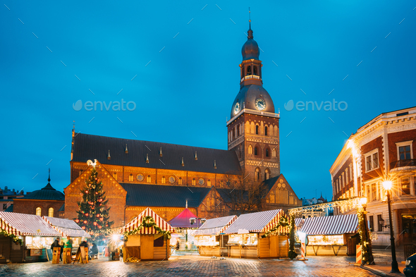Riga, Latvia. Christmas Market On Dome Square With Riga Dome Cathedral. Christmas Tree And Trading - Stock Photo - Images