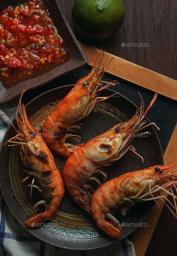 Grilled shrimp with spicy dipping sauce Stock Photo by Studio_OMG