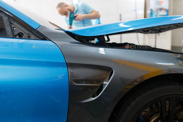 Car wrapping, protective foil or film coating - Stock Photo - Images