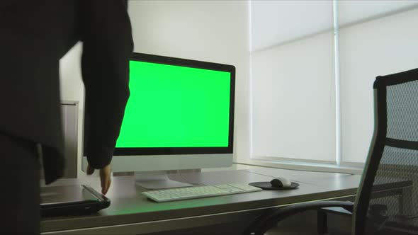Woman In Office Using Computer Green Screen 2