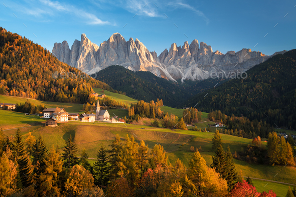 Autumn landscape with church with Dolomites mountains - Stock Photo - Images