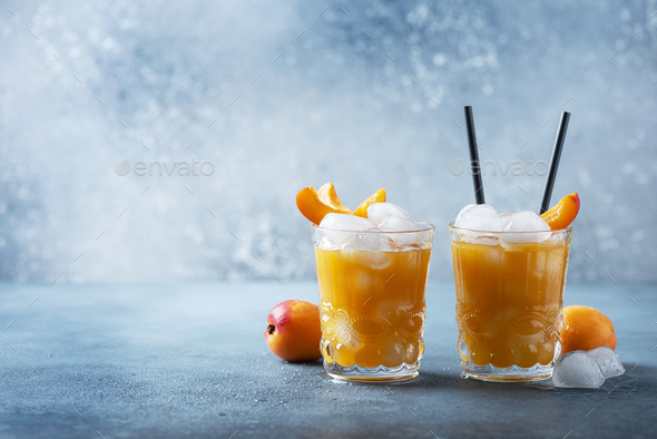 Summer juice with apricots and ice
