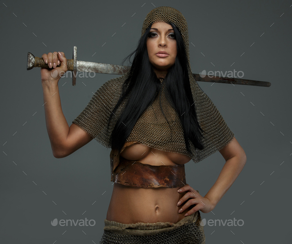 Beautiful female in ancient armor - Stock Photo - Images