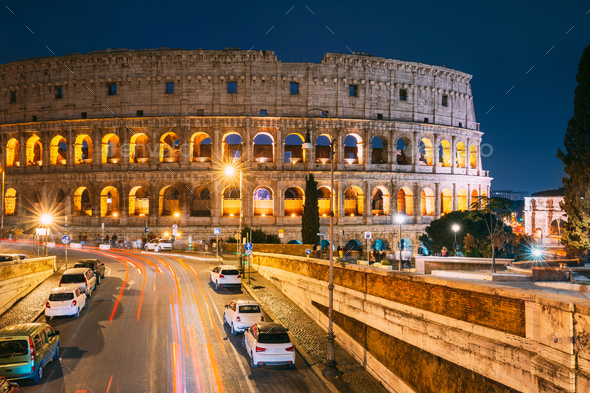 Rome, Italy. Colosseum Also Known As Flavian Amphitheatre In Evening Or Night Time - Stock Photo - Images