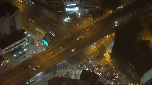 Car Traffic in A Night City at A Crossroads alt