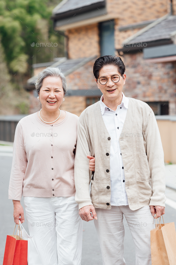 Senior Couple taking a walk together in the community