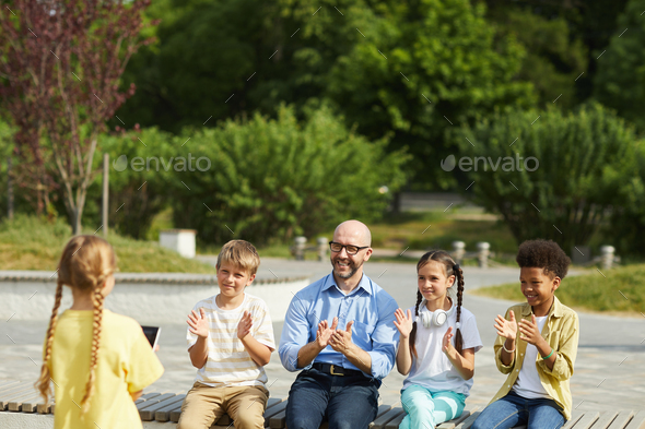 Kids Applauding Cute Girl in Outdoor Lesson
