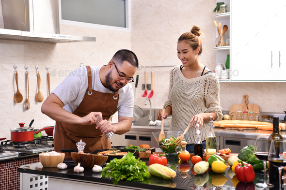 Couple Cooking In The Kitchen Stock Photo By Amenic181 Photodune
