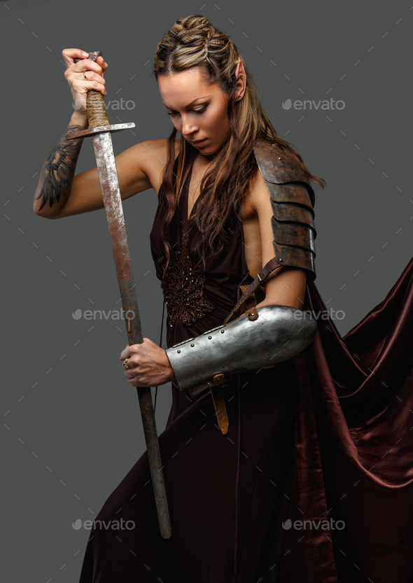 Elf woman warrior with sword.