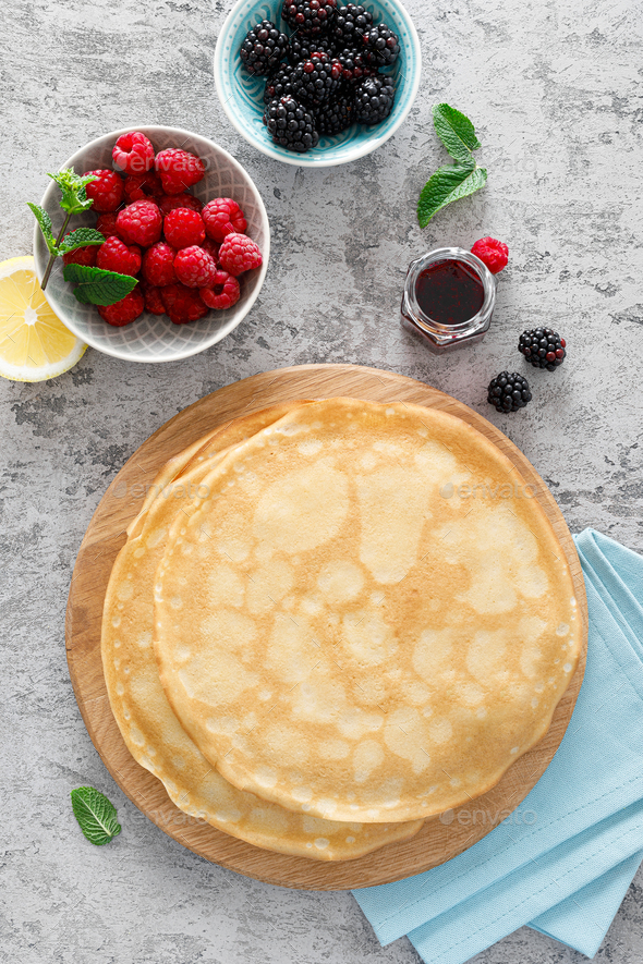 9d1a9591Thin crepes with fresh berries and lemon zest. Pancakes with raspberry and blackberry.