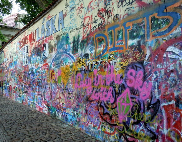 wall covered of graffiti in the city