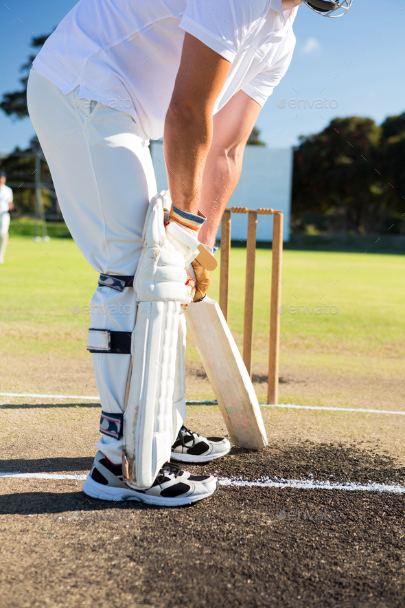 Low Section Of Man Playing Cricket At Sports Field Stock, 57% OFF