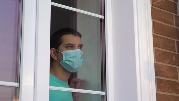 Man in Medical Mask Stay at Home. Self Isolation.