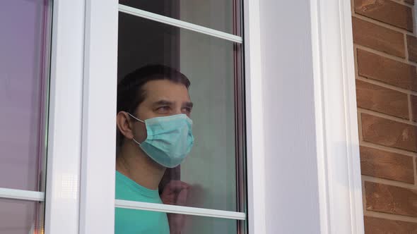 Man in Medical Mask Stay at Home. Self Isolation. alt