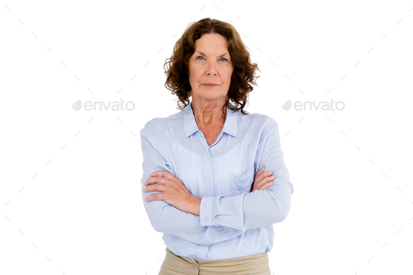 Mature Female Executive With Her Arms Crossed Stock Photo