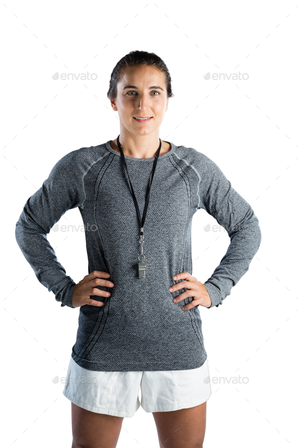 Portrait of female rugby coach with hands on hip