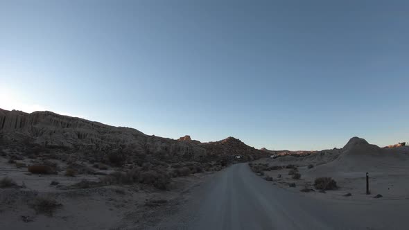 Drivers Point of View, Driving through Red Rock Canyon State Park, morning alt