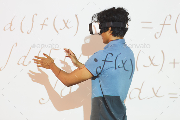 Analyzing math calculations in VR device - Stock Photo - Images