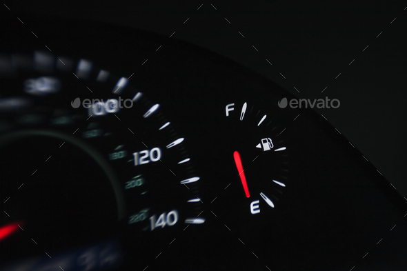 Close up of gas gauge on empty in a car.
