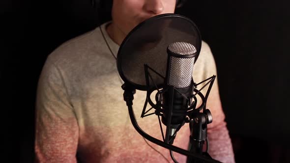 A Professional Announcer Makes a Recording in the Studio