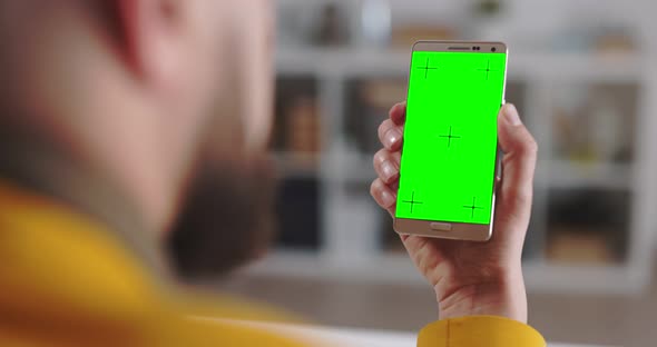 Man Using Mobile with Green Screen
