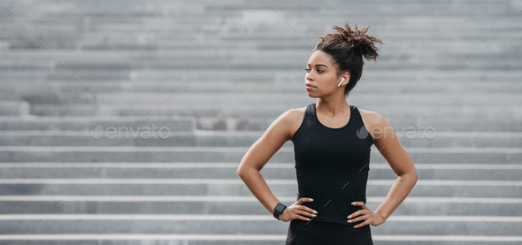 Jogging exercises and healthy lifestyle. Seriously african american girl in sportswear with fitness