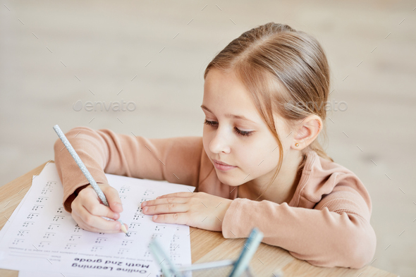 Cute Girl Doing Math Homework