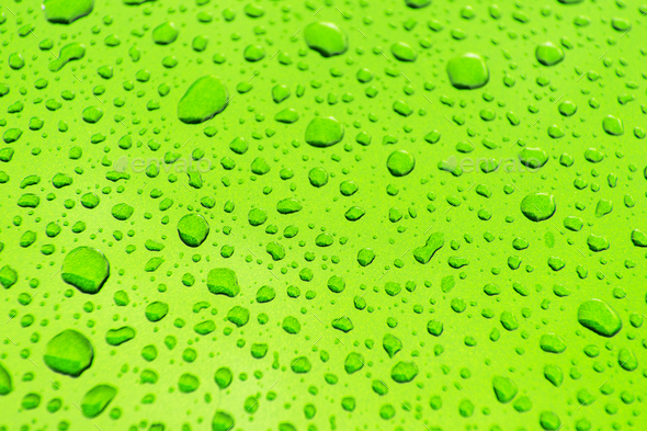Bright Green Car Body Paint Covered by Car Wash Water Drops Background