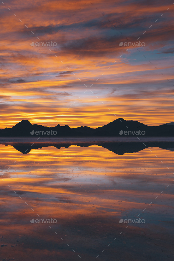 The sky at sunset. Layers of cloud reflecting in the shallow waters flooding the Bonneville Salt Flats