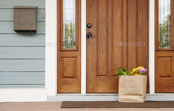 54024,Grocery bag on front stoop