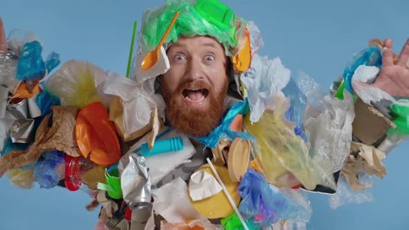 Adult man wearing costume from plastic, showing different emotions