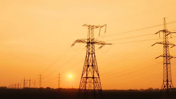 High Voltage Power Lines At The Sunset Time 3 alt