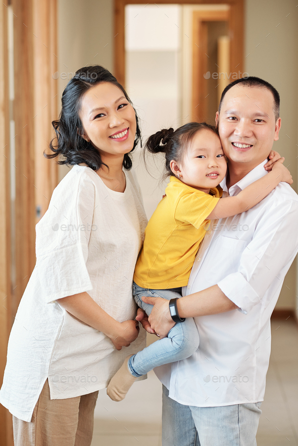 Happy Vietnamese family Stock Photo by DragonImages PhotoDune