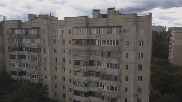 an Ugly Soviet Building During Cloudy Weather