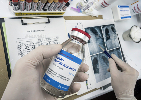 Pediatric doctor detects diagnosis in a child lung under five years old affected by Kawasaki disease - Stock Photo - Images