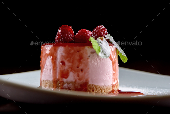 Tasty raspberry souffle with mint - Stock Photo - Images