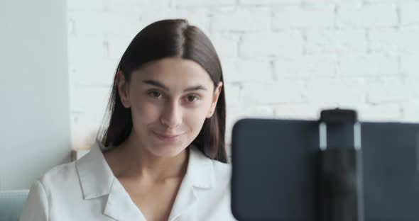 Female Blogger Starting Streaming Online in a Social Network and Communicates with Her Subscribers alt