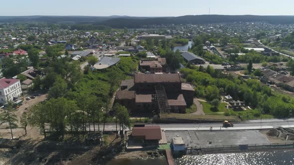 Aerial view of old red brick factory with an iron roof on the outskirts of the city 31 alt