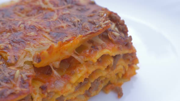 Traditional Italian cusine lasagne food 4K 2160p UHD panning   footage  - Lasagne food on plate clos