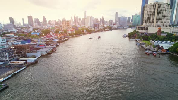 4K UHD : Bangkok River drone view. Flying over the Chao Phraya River alt