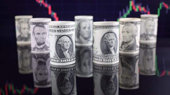 American Dollars Against The Background Of Stock Market Financial Data 2.