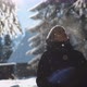 Young Woman Enjoying a Winter Day in Nature in Forest, Snowing on a Sunny Day, Slow Motion, Portrait - VideoHive Item for Sale