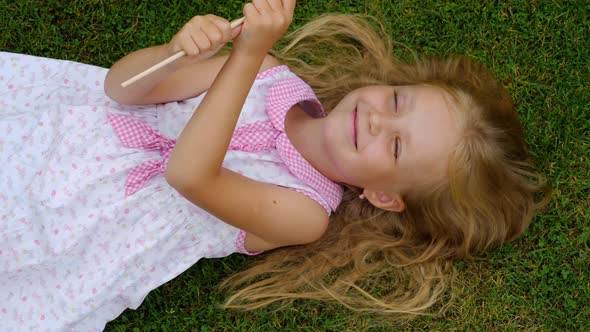 Child with candy summer