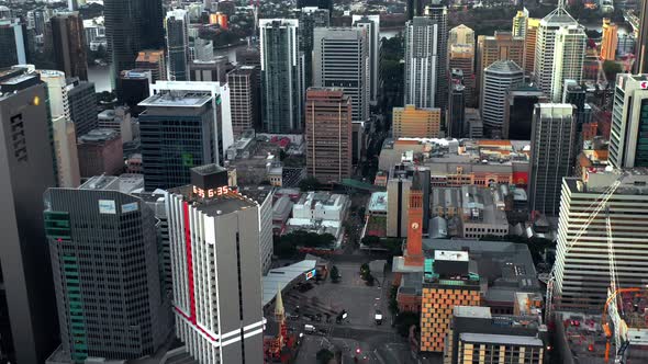 Fly Over King George Square Park With City Hall Clock Tower In Brisbane CBD, Queensland Australia. A alt