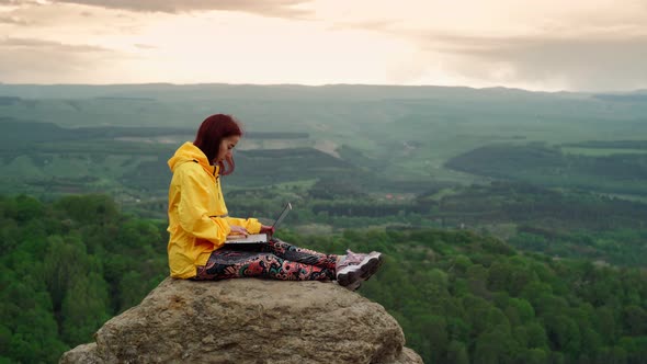 Woman Freelancer Works at Laptop on Top Mountain Backdrop Stunning Mountain alt