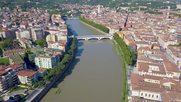 Verona, Italy: Aerial view of river and Bridges.Drone flies over the Adige river.Aerial video in 4K alt